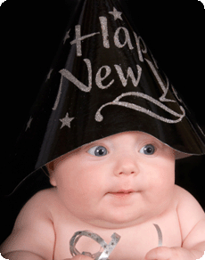 Little baby wearing a Happy New Year hat